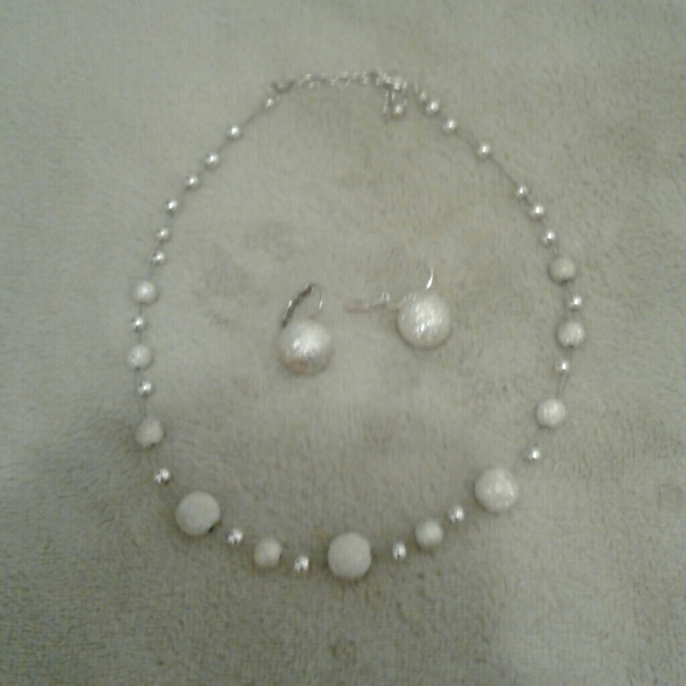 NWOT necklace with matching earrings.